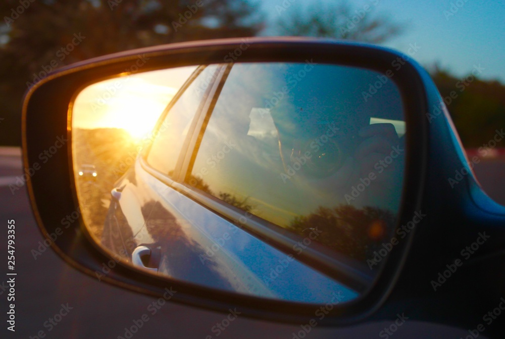 mirror of a car on the road