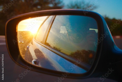 mirror of a car on the road © Matheus