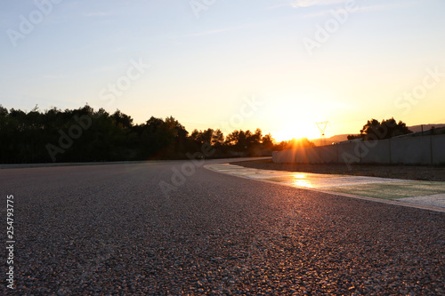 Tarmac closeup on racetrack during sunset in Castelolli in Spain