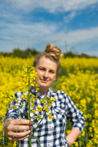 Farmer hold rape flower