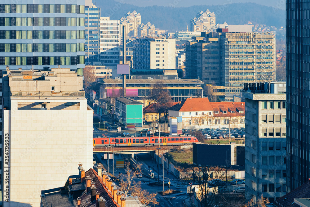 Fototapeta premium Busy modern downtown with city center architecture in Ljubljana