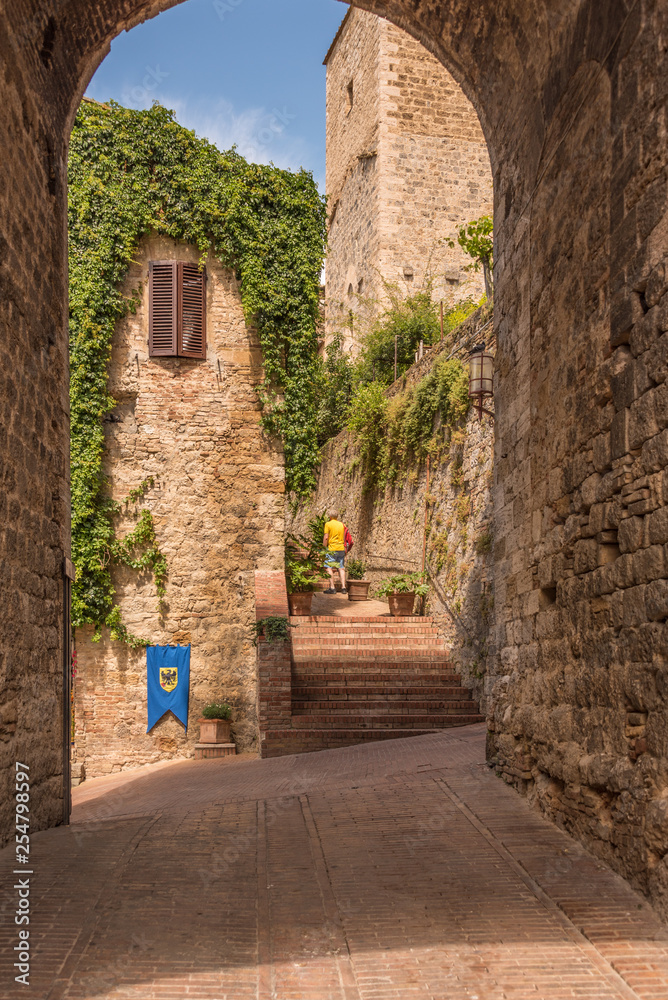 narrow street in old town of San Gimignano Italy