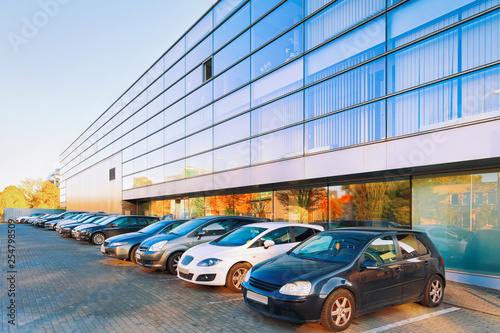 Сars parked on street at Office corporate building