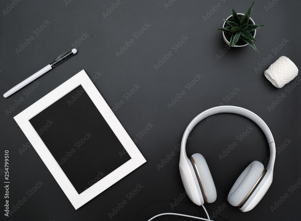 Mockup, Photo Frame, Headphones, Pen, and Cactus Write object on Black background Mockup, Photo Frame, Headphones, Pen, and Cactus Write object on Black background