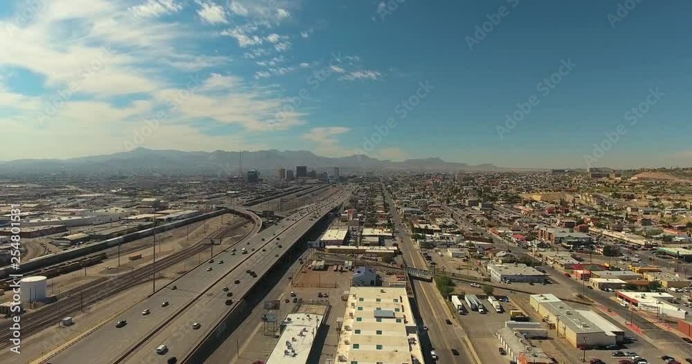 Aerial, rising, drone shot, overlooking the city and cars, on the highway, on a sunny, summer day, in El Paso, Texas, United states of america Aerial, rising, drone shot, overlooking the city and cars, on the highway, on a sunny, summer day, in El Paso, Texas, United states of america