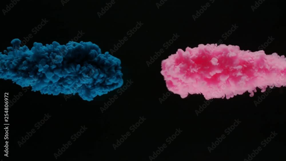 Super slowmotion shot of color inks in water. Shot with high speed camera at 4K.