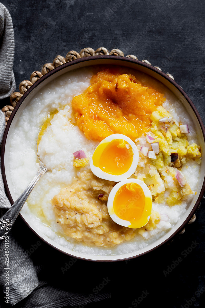 Indian comfort food - boiled rice, mashed pumpkin and potato, boiled lentil and 7-minutes egg. Indian comfort food - boiled rice, mashed pumpkin and potato, boiled lentil and 7-minutes egg.