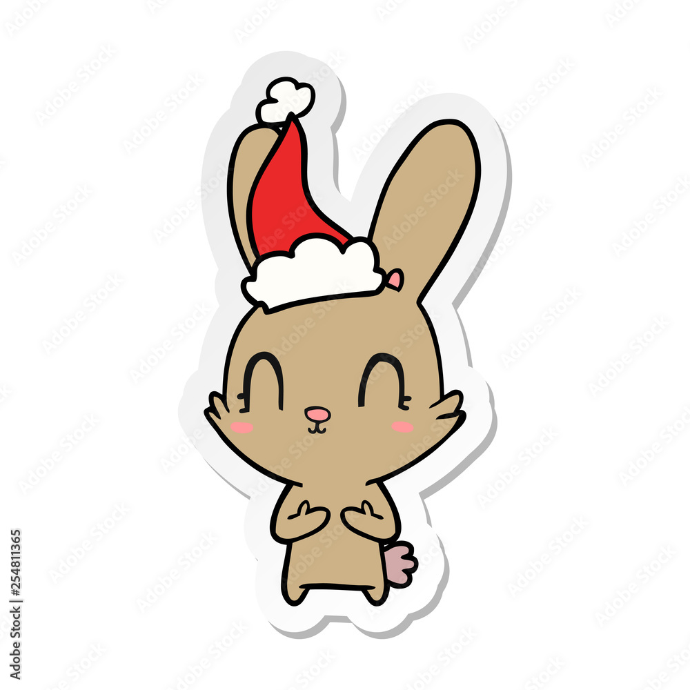 cute sticker cartoon of a rabbit wearing santa hat