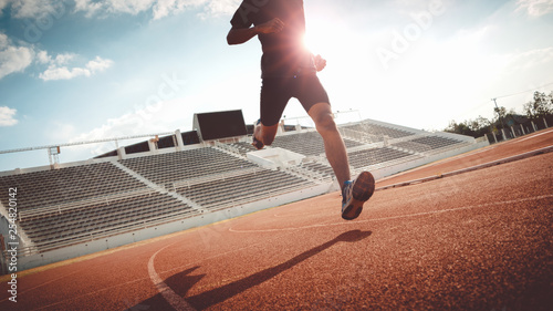 Fototapeta Naklejka Na Ścianę i Meble -  Sport Backgrounds, Male runner ready for sports exercise, Athlete running on athletic track.