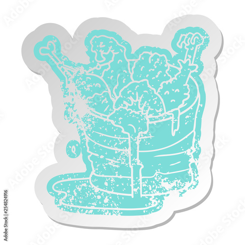 distressed old sticker bucket of fried chicken