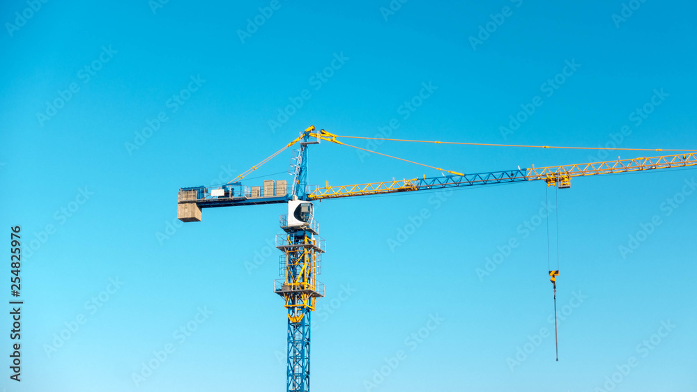 Tower crane at the construction site Tower crane at the construction site