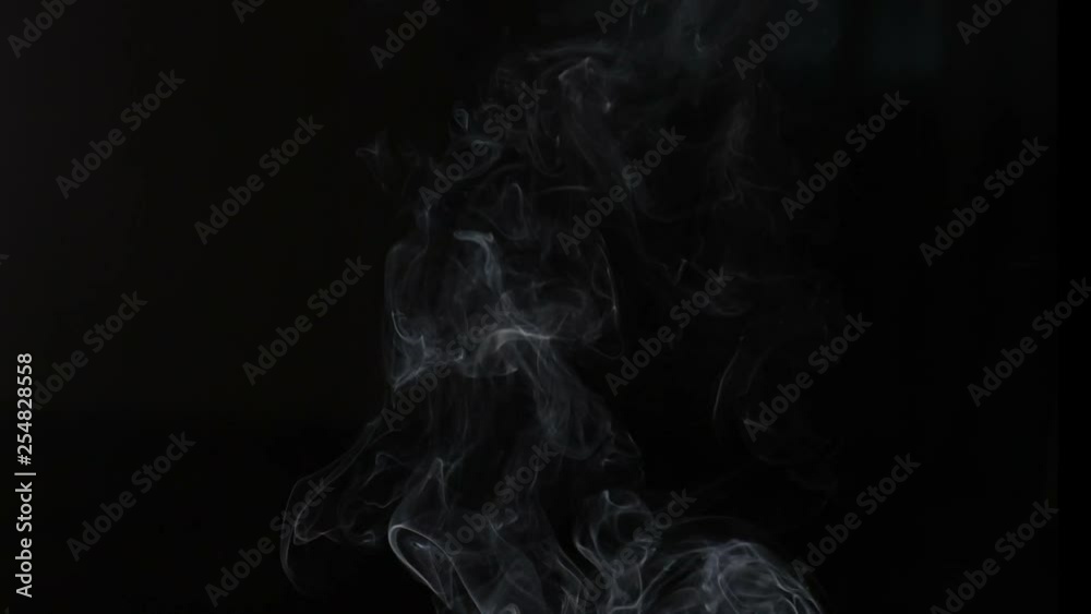 White Steam Rises from the Pan. White Steam rises from a large pot that is behind the scenes. Shot on Black background. Filmed at a speed of 180fps. hd White Steam Rises from the Pan. White Steam rises from a large pot that is behind the scenes. Shot on Black background. Filmed at a speed of 180fps. hd