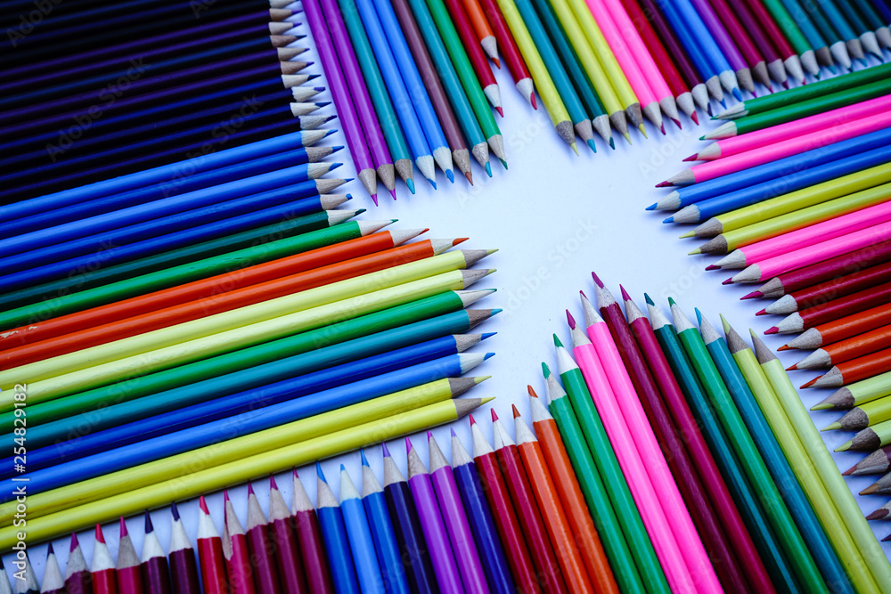 Fototapeta premium Star shape, made from wood colored pencils