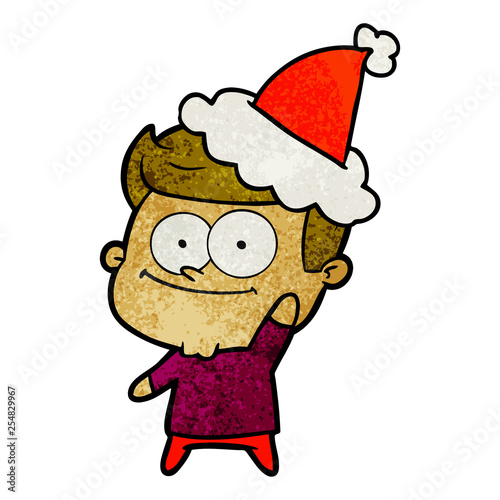 textured cartoon of a happy man wearing santa hat © lineartestpilot