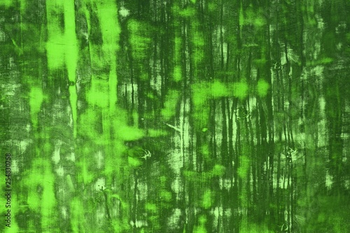 green vintage plywood with different big scratched spots texture - beautiful abstract photo background