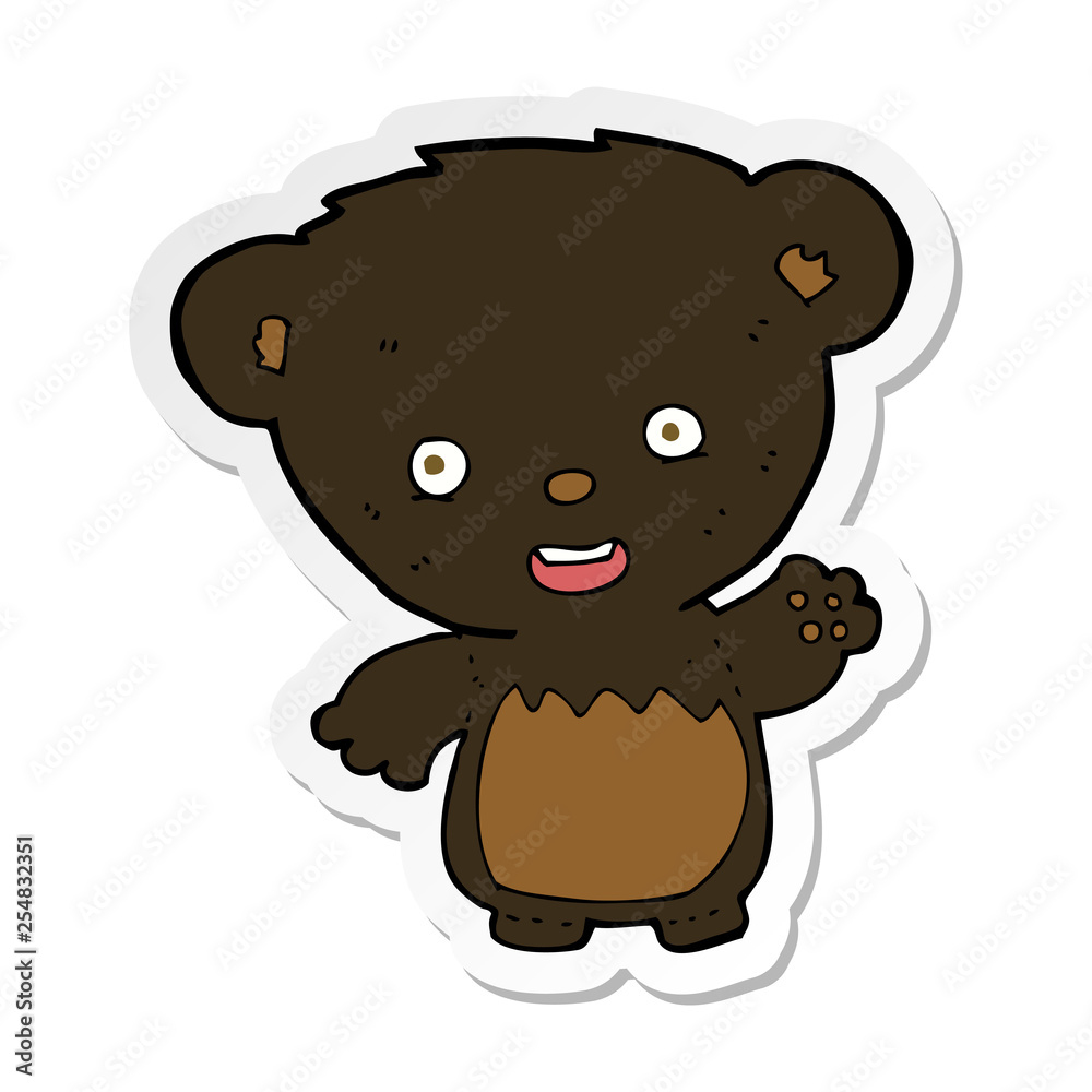 sticker of a cartoon black bearcub waving sticker of a cartoon black bearcub waving
