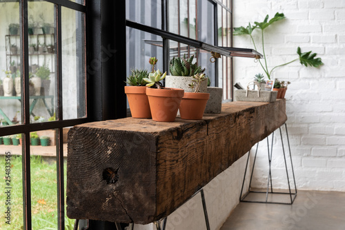 A shelf or counter made from a beam of wood.