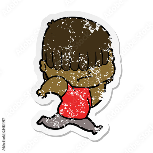 distressed sticker of a cartoon boy with untidy hair