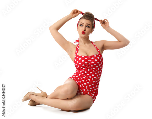 Bild auf Leinwand Playful pin-up woman on white background