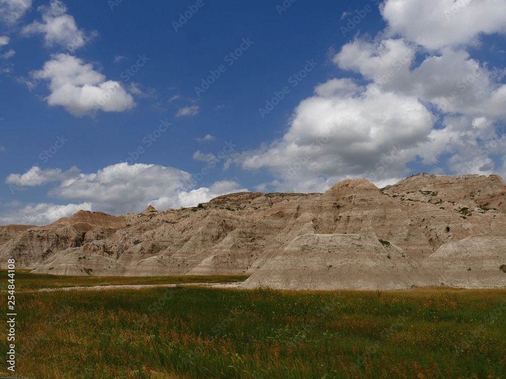 Badlands National Park in South Dakota, USA, with gorgeous clouds in the skies.