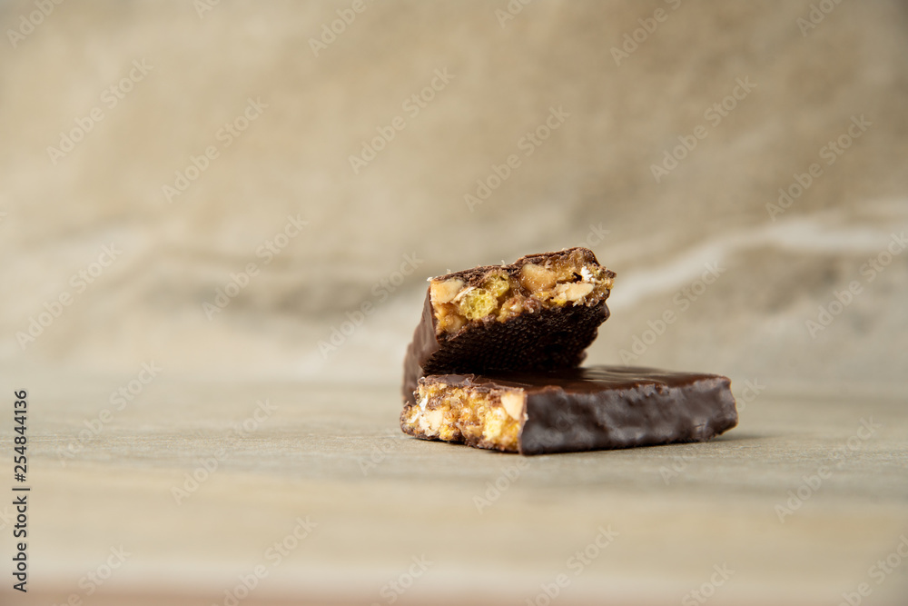 Muesli and cereal bar on marble stone background Muesli and cereal bar on marble stone background
