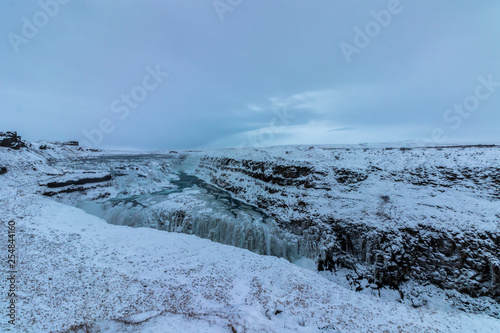 Gullfos Waterfall Frozen During Winter, Iceland photo