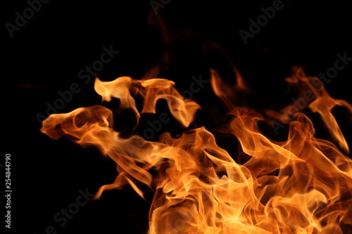 burning flame on dark background for abstract graphic design purpose