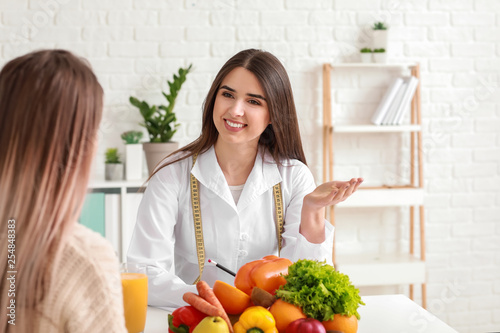Young woman visiting nutrit...