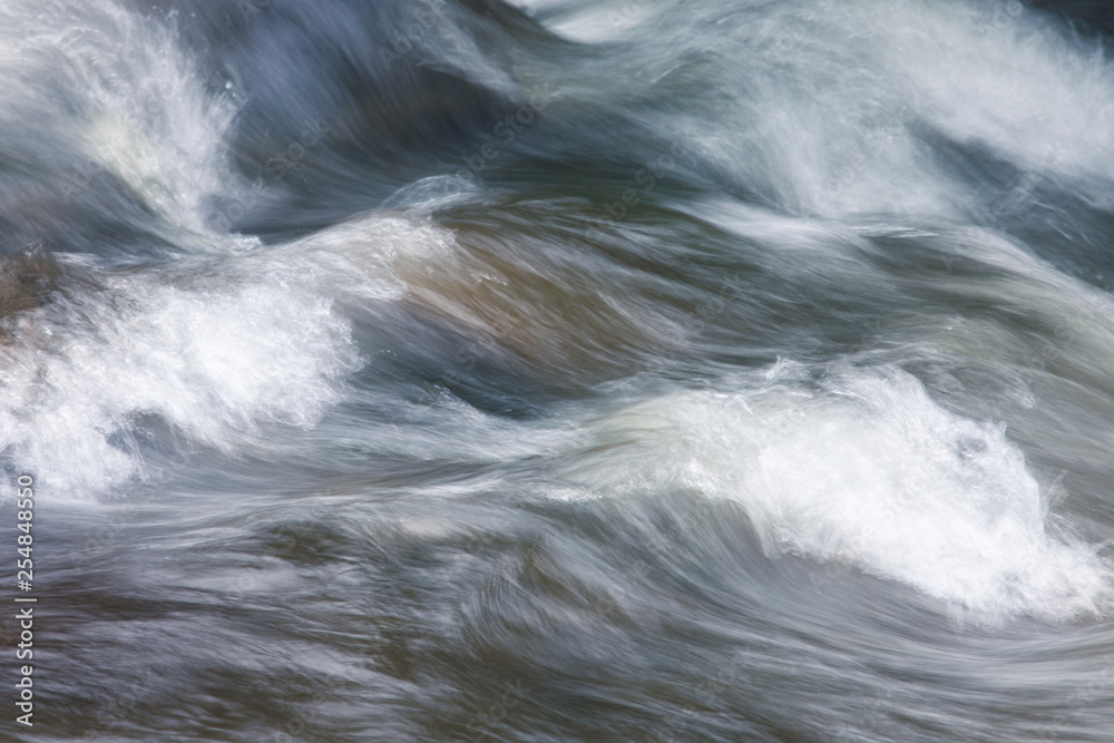 Abstract nature background of water flowing fast Abstract nature background of water flowing fast
