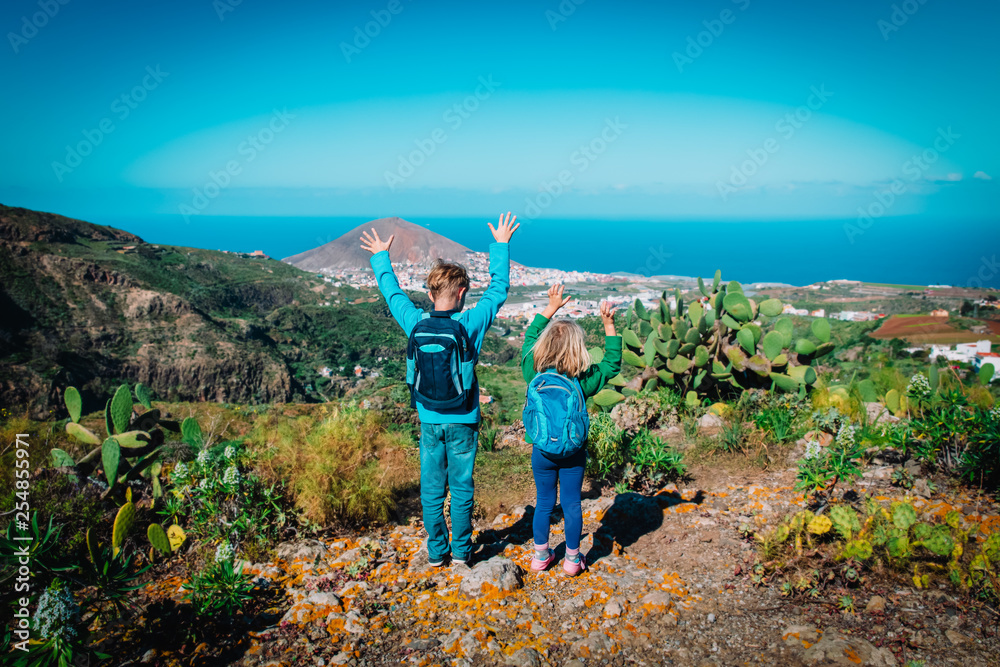 little boy and girl travel in Grand Canaria, family hiking in nature