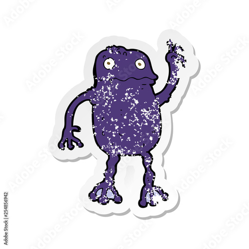 retro distressed sticker of a cartoon poisonous frog