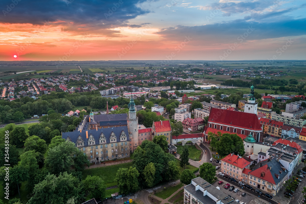 Oleśnica castle with city panorama at the sunset aerial view