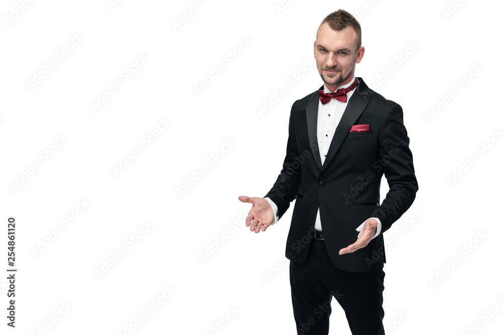 portrait of a businessman pointing at copy space