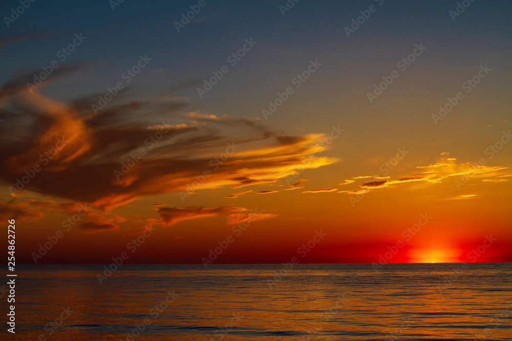 beautiful sky with clouds at sunset over the sea