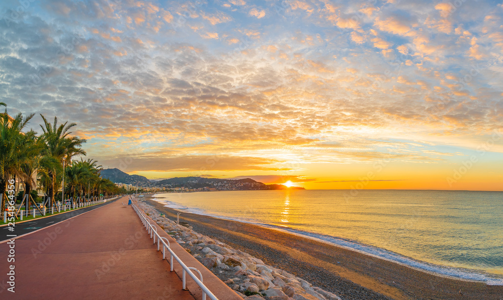 Landscape with colorful sunrise panorama over the bay of Angels, Nice, French Riviera coast