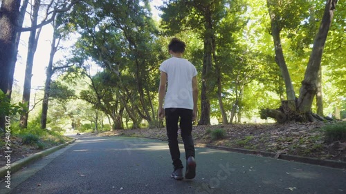 Drunk Intoxicated Japanese Business Man Staggering Around While Walking Home in Morning After Partying