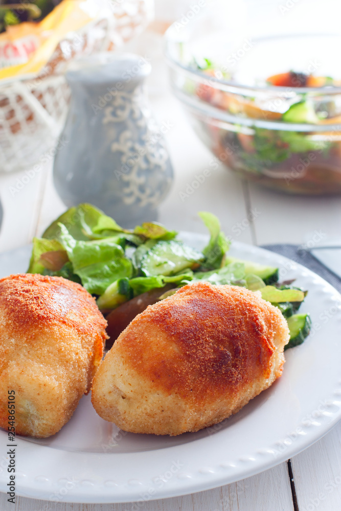 Chicken Kiev cutlets with filling, selective focus Chicken Kiev cutlets with filling, selective focus