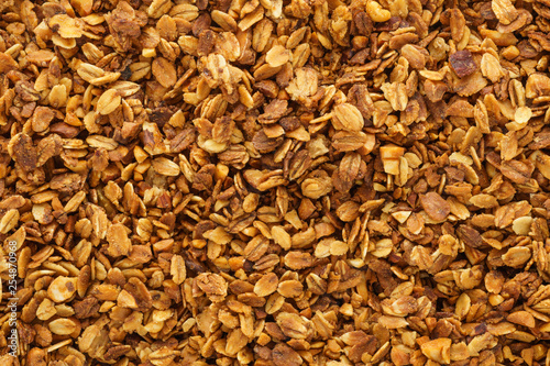 Schilderij op canvas Homemade healthy granola with oats, nuts and honey.