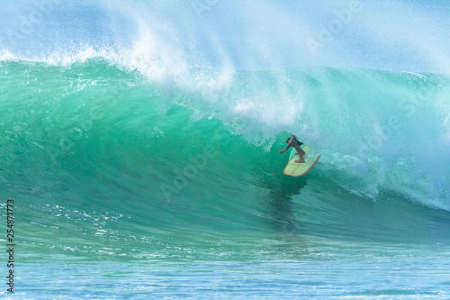 Surfer Tube Rides Inside Hollow Crashing Ocean Wave © ChrisVanLennepPhoto