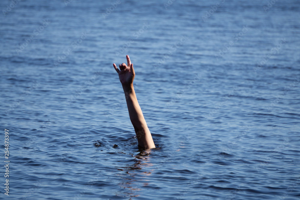drowning man Sticking hand out of water