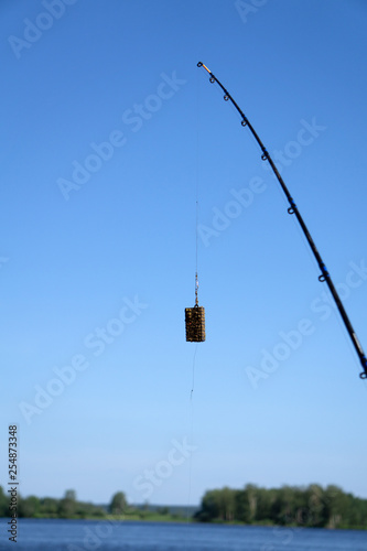 Feeder for fishing in weight forty gramme with swivel isolated on white. Clipping path included.