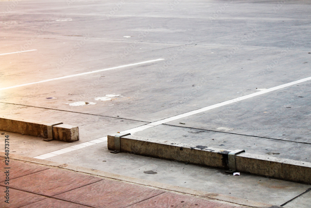 empty parking lot Car park In the area gas station with cement wheel