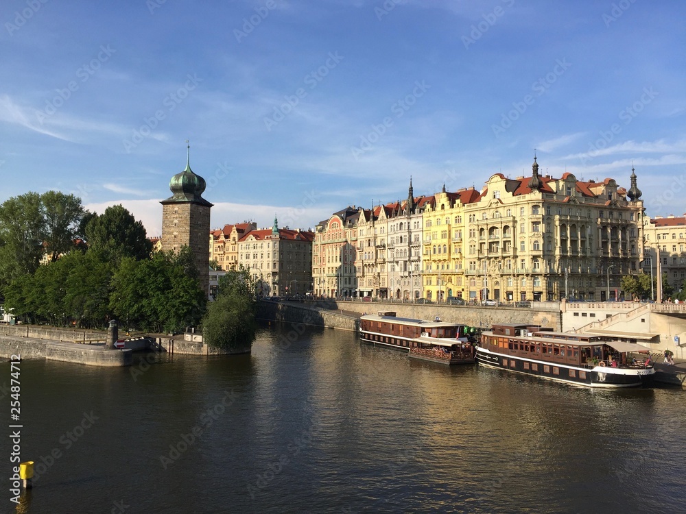 The Šítkov water tower and the banks of the Vltava River seen from Jirásek Bridge in Prague, Czech Republic The Šítkov water tower and the banks of the Vltava River seen from Jirásek Bridge in Prague, Czech Republic