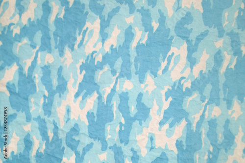 A blue camouflage pattern as a background .