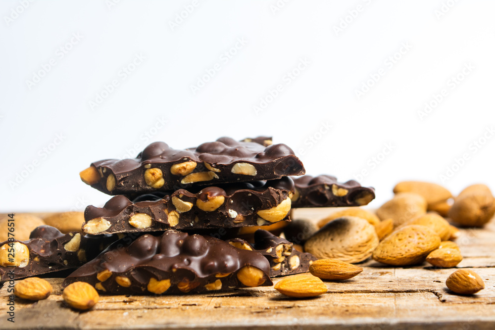 Chocolate with almonds on a table Chocolate with almonds on a table
