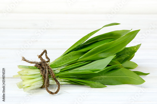 Ramson or wild garlic on white  kitchen table
