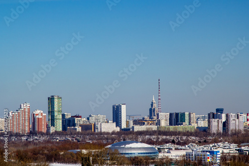 view of the buildings in the city from afar