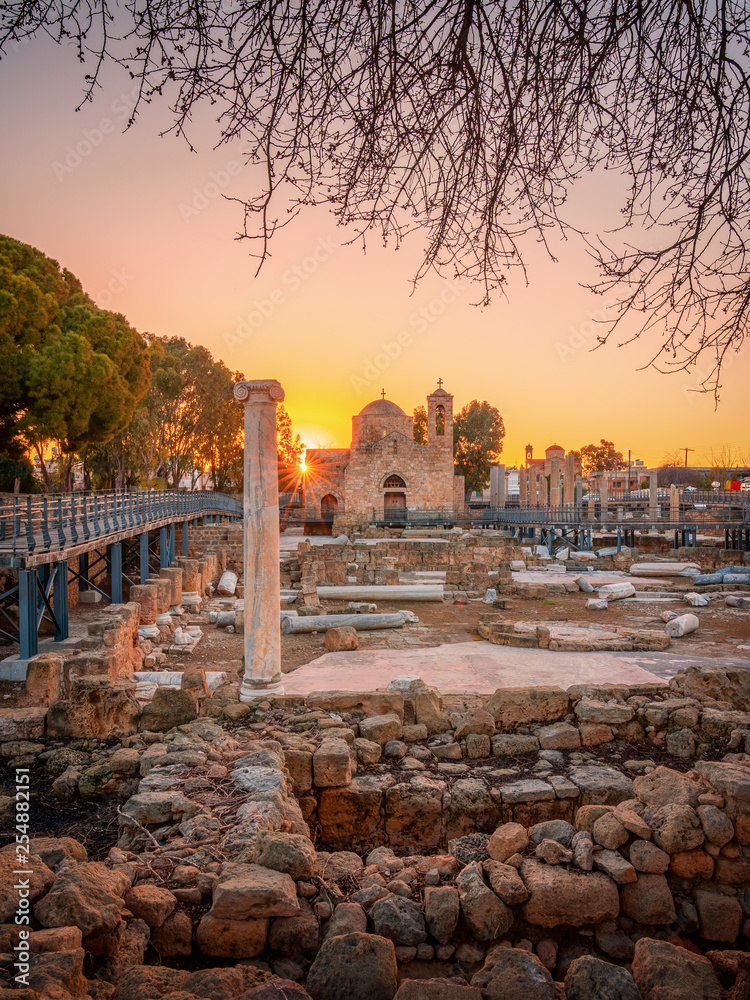 Fototapeta premium St Pauls Column and Agia Kyriaki Chrysopolitissa in Paphos on a sunrise, Cyprus