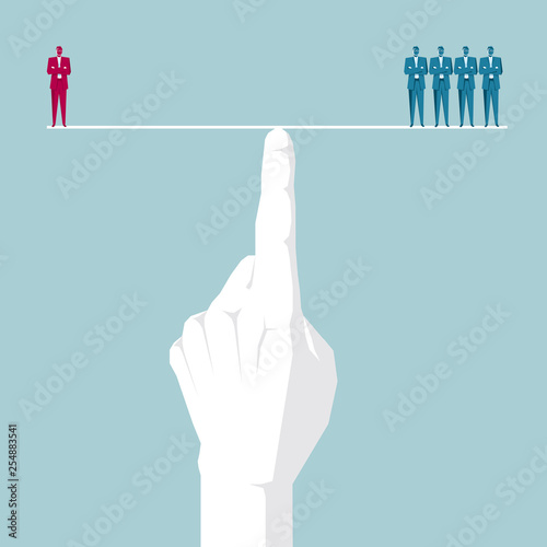 Businessman stands on the balance. Isolated on blue background.