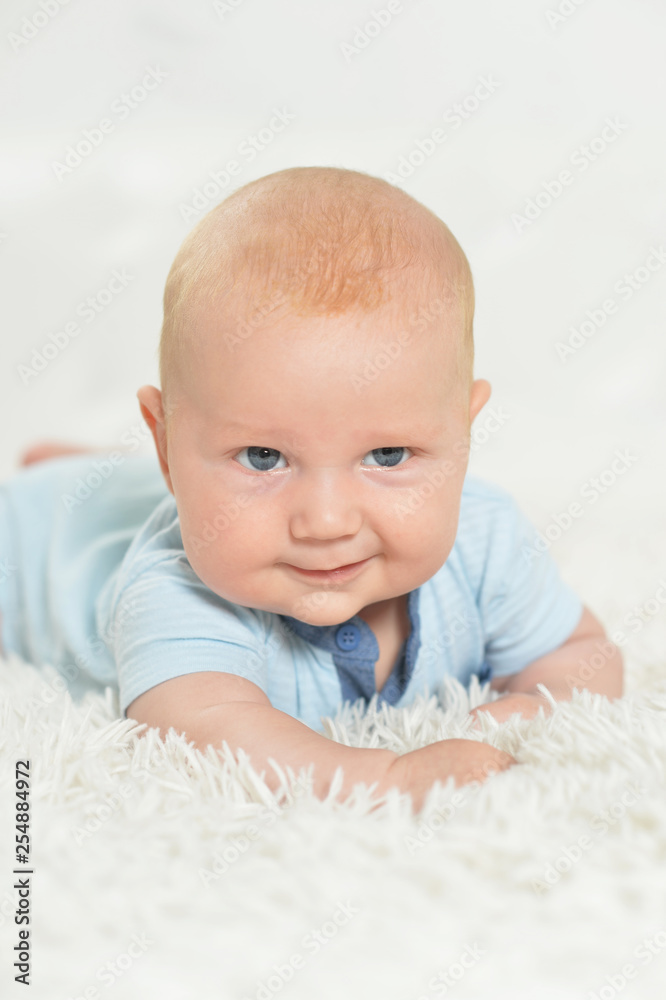 Portrait of beautiful baby boy on bed Portrait of beautiful baby boy on bed